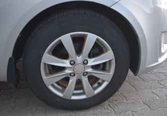 Подержанный автомобиль Kia Rio Sedan 2012 года (9 фото)