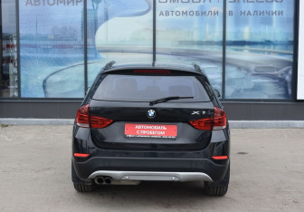 Подержанный автомобиль BMW X1 2013 года (6 фото)