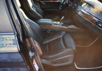 Подержанный автомобиль BMW X6 2013 года (10 фото)