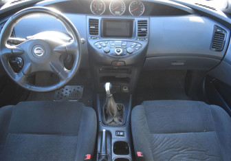 Подержанный автомобиль Nissan Primera Sedan 2004 года (12 фото)