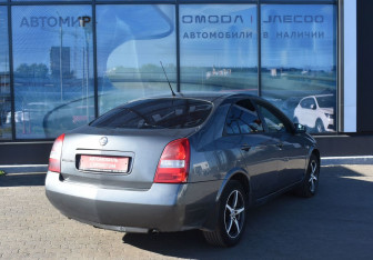 Подержанный автомобиль Nissan Primera Sedan 2004 года (5 фото)