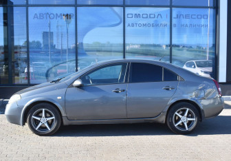 Подержанный автомобиль Nissan Primera Sedan 2004 года (8 фото)