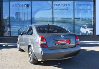 Подержанный автомобиль Nissan Primera Sedan 2004 года (7 фото)