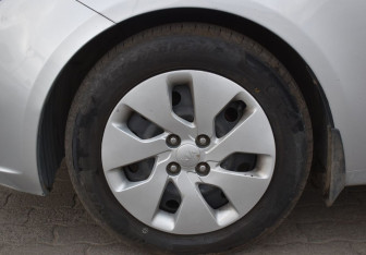 Подержанный автомобиль Kia Rio Sedan 2013 года (9 фото)