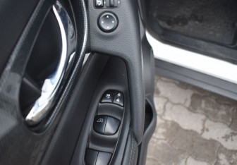 Подержанный автомобиль Nissan X-Trail 2015 года (14 фото)