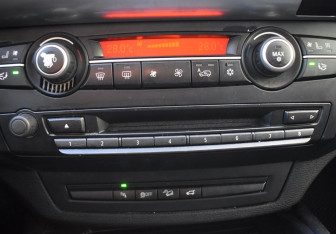 Подержанный автомобиль BMW X6 2013 года (17 фото)