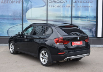 Подержанный автомобиль BMW X1 2013 года (7 фото)