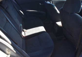 Подержанный автомобиль Nissan Primera Sedan 2004 года (11 фото)