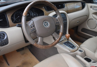 Подержанный автомобиль Jaguar X-Type Sedan 2006 года (13 фото)