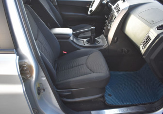 Подержанный автомобиль SsangYong Kyron 2011 года (10 фото)