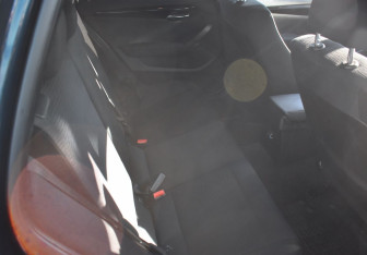 Подержанный автомобиль BMW X1 2012 года (11 фото)