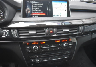 Подержанный автомобиль BMW X5 2014 года (16 фото)