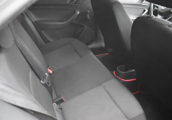 Подержанный автомобиль Skoda Rapid Liftback 2014 года (11 фото)