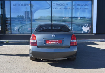 Подержанный автомобиль Nissan Primera Sedan 2004 года (6 фото)