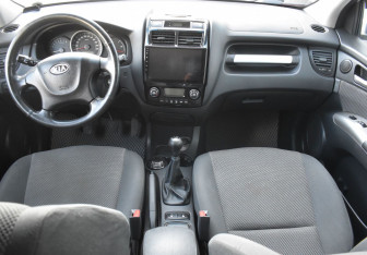 Подержанный автомобиль Kia Sportage 2009 года (12 фото)