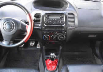 Подержанный автомобиль Geely MK Cross 2012 года (11 фото)