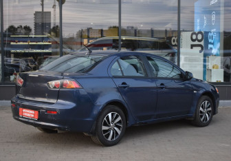 Подержанный автомобиль Mitsubishi Lancer Sedan 2011 года (6 фото)