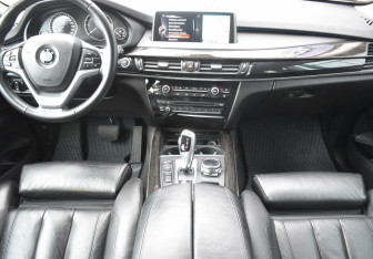 Подержанный автомобиль BMW X5 2014 года (14 фото)