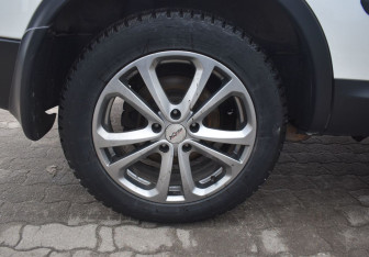 Подержанный автомобиль Nissan Qashqai+2 2013 года (9 фото)