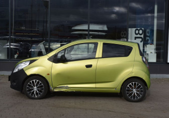 Подержанный автомобиль Chevrolet Spark 2011 года (9 фото)