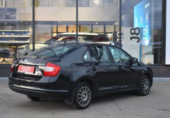 Подержанный автомобиль Skoda Rapid Liftback 2014 года (5 фото)