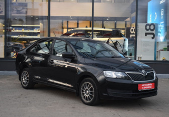 Подержанный автомобиль Skoda Rapid Liftback 2014 года (3 фото)