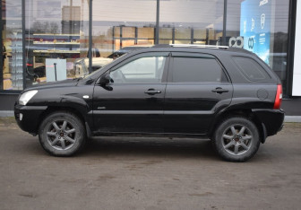Подержанный автомобиль Kia Sportage 2007 года (8 фото)