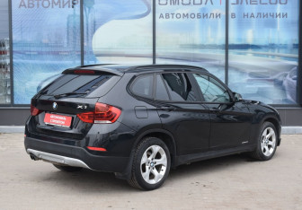 Подержанный автомобиль BMW X1 2013 года (5 фото)