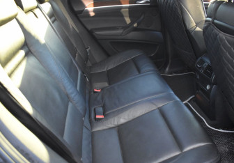 Подержанный автомобиль BMW X6 2013 года (11 фото)