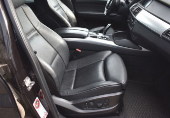 Подержанный автомобиль BMW X6 2011 года (10 фото)