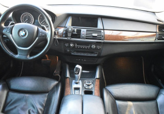 Подержанный автомобиль BMW X6 2013 года (12 фото)