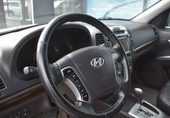 Подержанный автомобиль Hyundai Santa Fe 2011 года (14 фото)