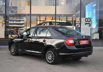 Подержанный автомобиль Skoda Rapid Liftback 2014 года (7 фото)